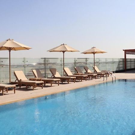 Al Riyadh Hotel Apartments อาบูดาบี ภายนอก รูปภาพ