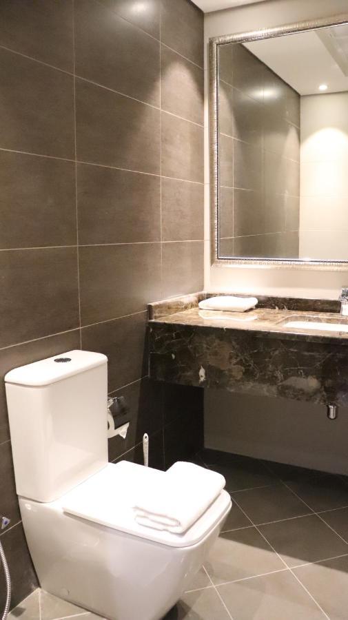 Al Riyadh Hotel Apartments อาบูดาบี ภายนอก รูปภาพ