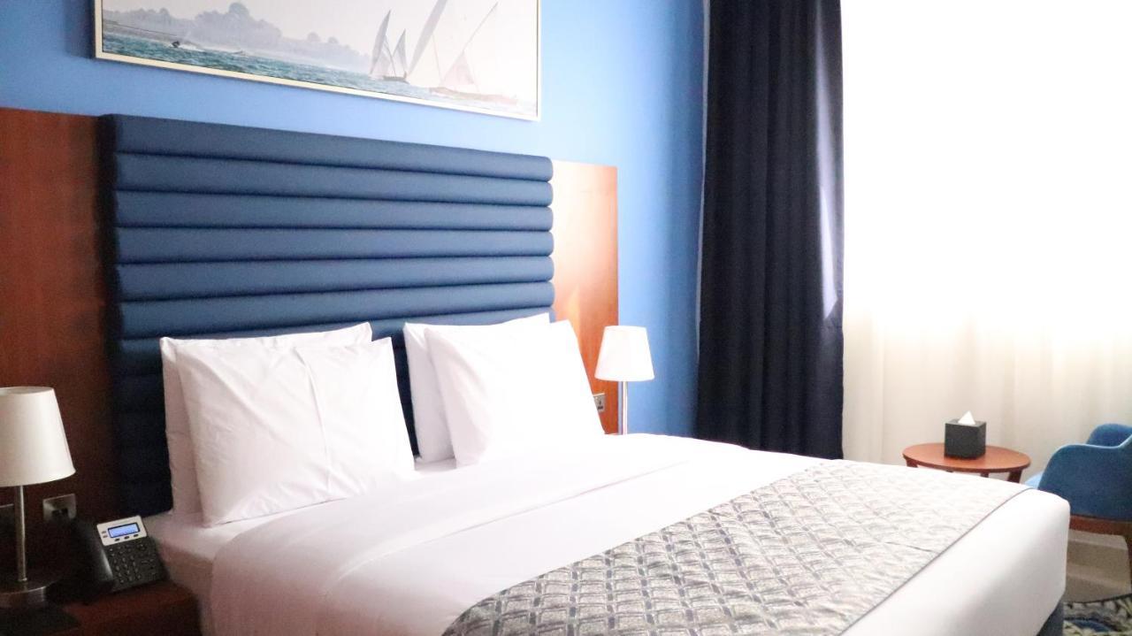 Al Riyadh Hotel Apartments อาบูดาบี ภายนอก รูปภาพ