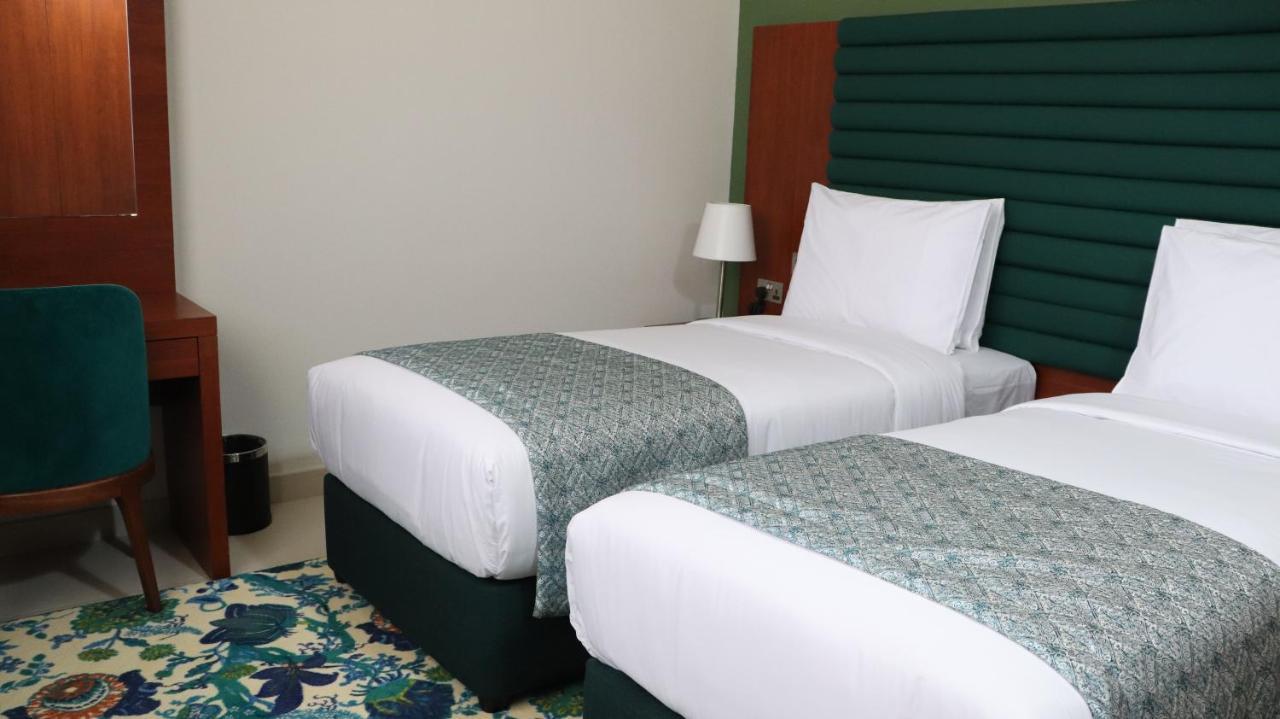 Al Riyadh Hotel Apartments อาบูดาบี ภายนอก รูปภาพ
