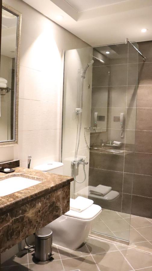 Al Riyadh Hotel Apartments อาบูดาบี ภายนอก รูปภาพ