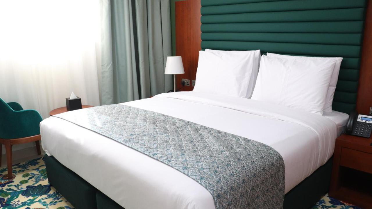 Al Riyadh Hotel Apartments อาบูดาบี ภายนอก รูปภาพ