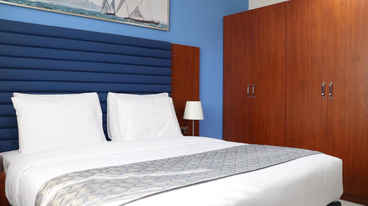 Al Riyadh Hotel Apartments อาบูดาบี ภายนอก รูปภาพ