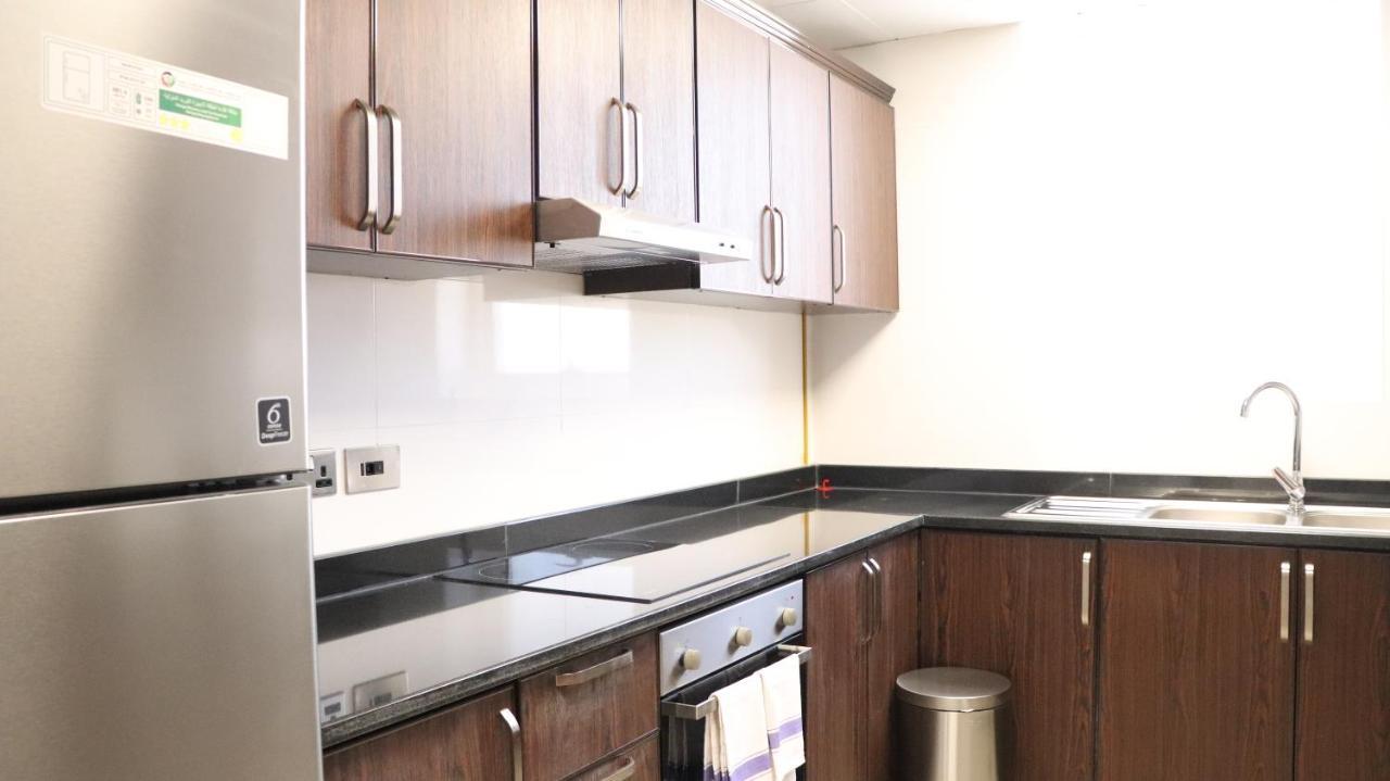 Al Riyadh Hotel Apartments อาบูดาบี ภายนอก รูปภาพ