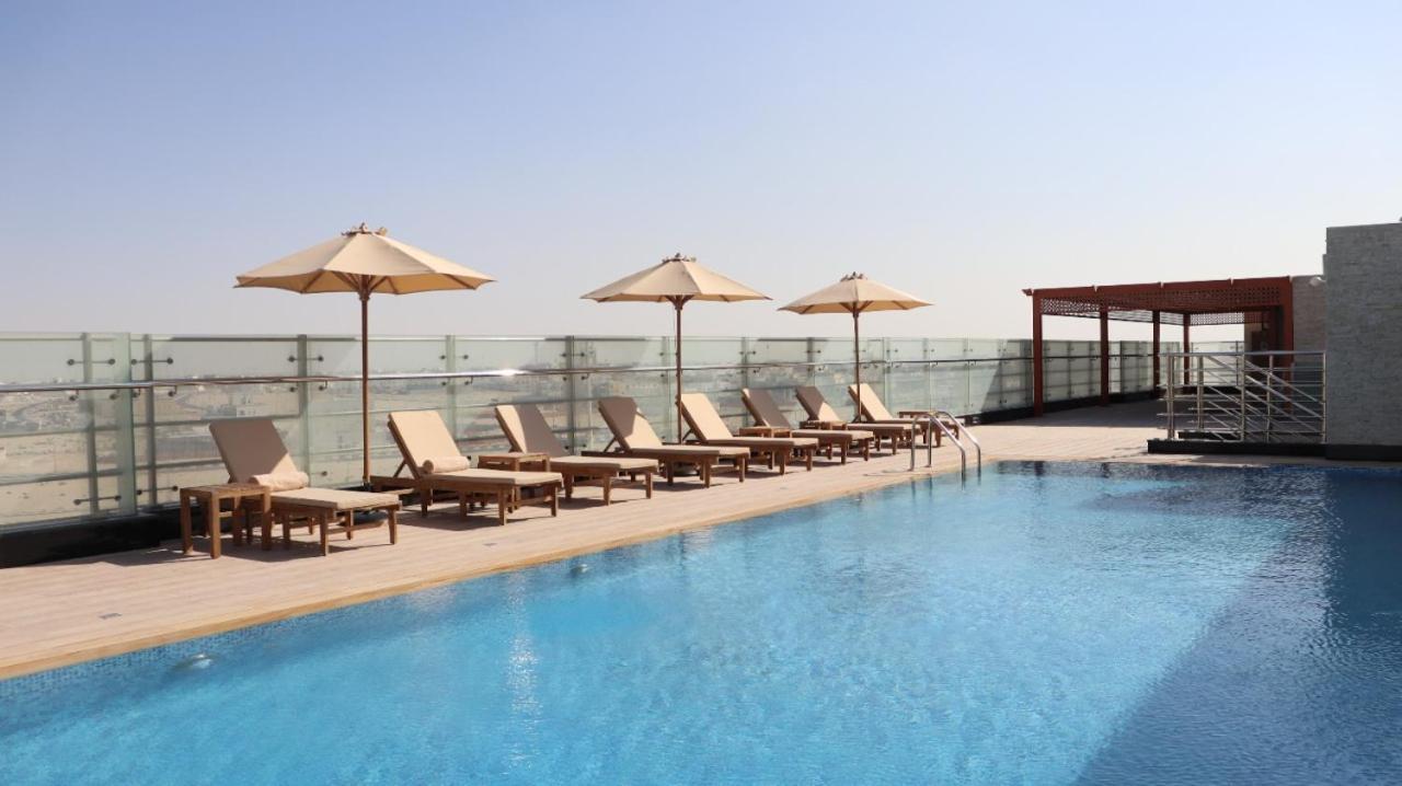 Al Riyadh Hotel Apartments อาบูดาบี ภายนอก รูปภาพ