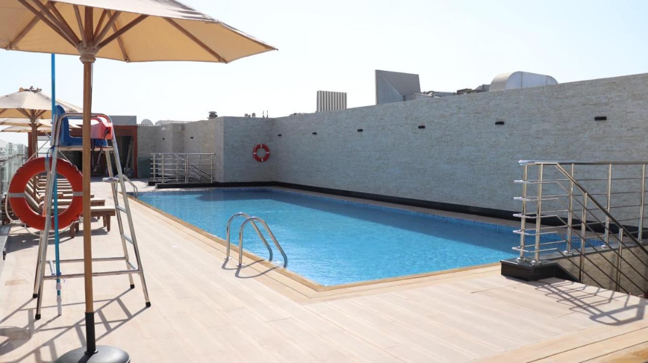 Al Riyadh Hotel Apartments อาบูดาบี ภายนอก รูปภาพ